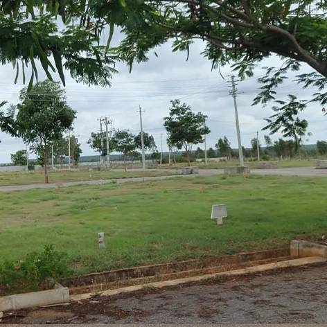 Sylvia City, Jangamakote, by Svamitva Open plots with lawns and shade trees at Sylvia City