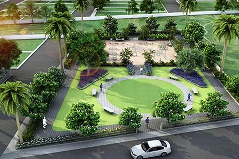 A landscaped garden with a circular lawn and palms, as planned at Sylvia City